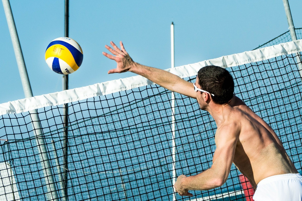 Moroccan youths play soccer at the Atlantic beach in Agadir